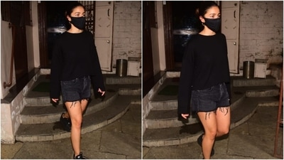 Alia accessorised her look with gold hoop earrings and black chunky lace-up sneakers. She also wore a black face mask to keep herself safe during the ongoing Covid-19 pandemic. (Varinder Chawla ) Alia accessorised her look with gold hoop earrings and black chunky lace-up sneakers. She also wore a black face mask to keep herself safe during the ongoing Covid-19 pandemic. (Varinder Chawla )