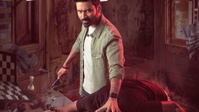 Dhanush on the poster for Maraan. Dhanush on the poster for Maraan.