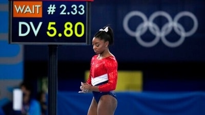 Simone Biles, of the United States, waits to perform on the vault during the artistic gymnastics women's final at the 2020 Summer Olympics, Tuesday, July 27, 2021, in Tokyo. The American gymnastics superstar has withdrawn the all-around competition to focus on her mental well-being. (AP Photo/Gregory Bull) (AP) Simone Biles, of the United States, waits to perform on the vault during the artistic gymnastics women's final at the 2020 Summer Olympics, Tuesday, July 27, 2021, in Tokyo. The American gymnastics superstar has withdrawn the all-around competition to focus on her mental well-being. (AP Photo/Gregory Bull) (AP)