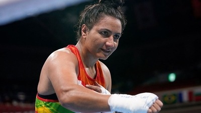 India's Pooja Rani Pooja Rani celebrates after winning against Algeria's Ichrak Chaib. (Getty Images) India's Pooja Rani Pooja Rani celebrates after winning against Algeria's Ichrak Chaib. (Getty Images)