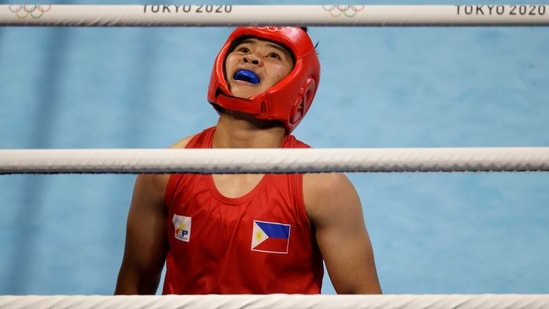 Tokyo 2020 Olympics - Boxing - Women's Featherweight - Quarterfinal - Kokugikan Arena - Tokyo, Japan - July 28, 2021. Nesthy Petecio of the Philippines reacts after winning her fight against Yeni Arias of Colombia REUTERS/Ueslei Marcelino(REUTERS)