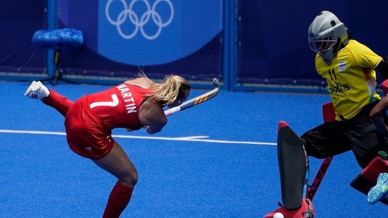India goalkeeper Savita (11) makes a save against Britain's Hannah Martin (7) during a women's field hockey match at the 2020 Summer Olympics, Wednesday, July 28, 2021, in Tokyo, Japan. (AP Photo/John Minchillo)(AP)