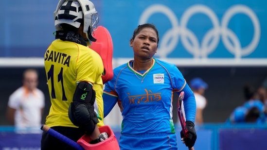 India's Deep Grace Ekka (3) reacts alongside goalkeeper Savita (11) during a women's field hockey match against Britain at the 2020 Summer Olympics, Wednesday, July 28, 2021, in Tokyo, Japan. (AP Photo/John Minchillo)(AP)