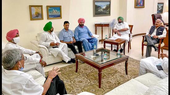 Punjab Congress president Navjot Singh Sidhu and others during a meeting with chief minister Capt Amarinder Singh in Chandigarh on Tuesday.