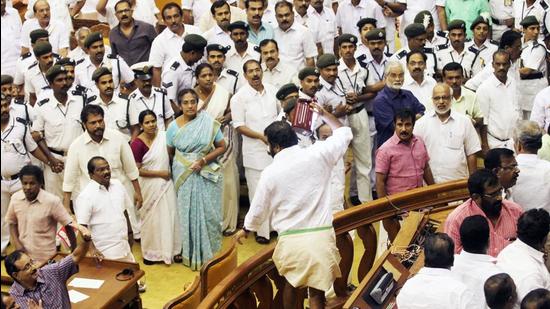 Kerala House witnessed violent scenes in March 2015 after Opposition legislators tried to prevent then finance minister KM Mani from presenting the budget, alleging his role in the bar bribery case. (HT Archive) Kerala House witnessed violent scenes in March 2015 after Opposition legislators tried to prevent then finance minister KM Mani from presenting the budget, alleging his role in the bar bribery case. (HT Archive)