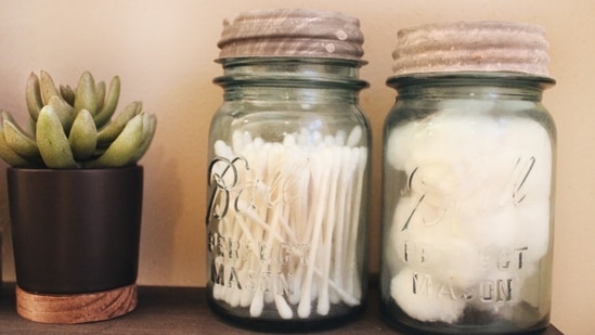 Reuse and recycle: Reuse food containers and jars. You can get creative with it and make something crafty like pots, pen stands, storage, etc.(Unsplash)