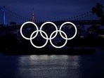 FILE PHOTO: The giant Olympic rings are pictured two days before the start of the one-year countdown to the Tokyo Olympics.