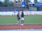 Neha Dhupia and Angad Bedi out for a stroll. They are expecting their second baby.