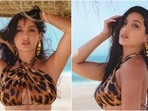 Nora Fatehi in <span class='webrupee'>₹</span>6k bralette and thigh-slit skirt celebrates 30 million Instagram followers Nora Fatehi in <span class='webrupee'>₹</span>6k bralette and thigh-slit skirt celebrates 30 million Instagram followers