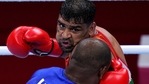 Satish Kumar, top, of India exchanges punches with Ricardo Brown of Jamaica during their men's super-heavy weight 91 kg preliminaries round Boxing match at the 2020 Summer Olympics, Thursday, July 29, 2021, in Tokyo, Japan. (AP) Satish Kumar, top, of India exchanges punches with Ricardo Brown of Jamaica during their men's super-heavy weight 91 kg preliminaries round Boxing match at the 2020 Summer Olympics, Thursday, July 29, 2021, in Tokyo, Japan. (AP)