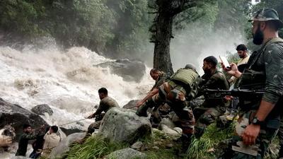 Army personnel during a rescue operation after flash floods due to a cloudburst at Honjar in Kishtwar district. (PTI) Army personnel during a rescue operation after flash floods due to a cloudburst at Honjar in Kishtwar district. (PTI)