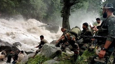 Army personnel during a rescue operation after flash floods due to a cloudburst at Honjar in Kishtwar district, Jammu and Kashmir on July 28. (PTI) Army personnel during a rescue operation after flash floods due to a cloudburst at Honjar in Kishtwar district, Jammu and Kashmir on July 28. (PTI)