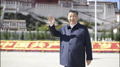 Chinese President Xi Jinping waves while visiting a public square below the Potala Palace in Lhasa in western China's Tibet Autonomous Region on July 22. (AP) Chinese President Xi Jinping waves while visiting a public square below the Potala Palace in Lhasa in western China's Tibet Autonomous Region on July 22. (AP)