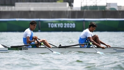 Tokyo 2020 Olympics - Rowing - Men's Lightweight Double Sculls - Semifinal 2 - Sea Forest Waterway, Tokyo, Japan - July 28, 2021. Arjun Lal of India and Arvind Singh of India react after competing REUTERS/Piroschka Van De Wouw (REUTERS)