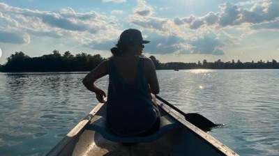 Priyanka goes for a boat ride on a sunny day. In this picture, PeeCee is seen wearing a comfy loose tank top and shorts. She paired it with a cap and shades. (Instagram/@priyankachopra)