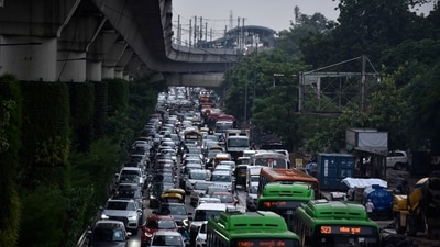 Slow moving traffic due to the rain, near Moti Bagh in New Delhi on July 28. Traffic jams were recorded on both days across several parts of the city and the Delhi traffic police noted nearly 50 stretches being inundate, with pumps used to flush out excess water. (Sanjeev Verma / HT Photo) Slow moving traffic due to the rain, near Moti Bagh in New Delhi on July 28. Traffic jams were recorded on both days across several parts of the city and the Delhi traffic police noted nearly 50 stretches being inundate, with pumps used to flush out excess water. (Sanjeev Verma / HT Photo)