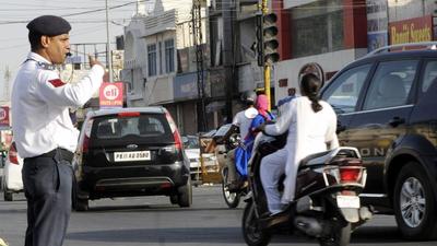 The home guard, Piyush, claimed he took the extreme step after he was transferred at the behest of the officer for stopping her car for a traffic light violation in Panchkula on July 17. (Representational photo) The home guard, Piyush, claimed he took the extreme step after he was transferred at the behest of the officer for stopping her car for a traffic light violation in Panchkula on July 17. (Representational photo)