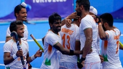 India's Haanpreet Singh (13) celebrates with his teammates after scoring on Argentina goalkeeper Juan Manuel Vivaldi during a men's field hockey match at the 2020 Summer Olympics, Thursday, July 29, 2021, in Tokyo, Japan. (AP) India's Haanpreet Singh (13) celebrates with his teammates after scoring on Argentina goalkeeper Juan Manuel Vivaldi during a men's field hockey match at the 2020 Summer Olympics, Thursday, July 29, 2021, in Tokyo, Japan. (AP)