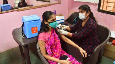 A beneficiary gets inoculated against Covid-19 at a vaccination centre in Byculla. (HT PHOTO) A beneficiary gets inoculated against Covid-19 at a vaccination centre in Byculla. (HT PHOTO)