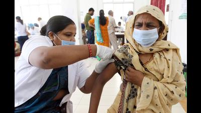 A beneficiary receives a dose of the COVID-19 vaccine, at Railway hospital, in Prayagraj (ANI Photo)