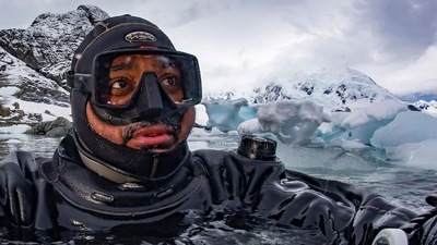 Dhritiman Mukherjee, 46, a photographer from Kolkata, dives beneath the ice, in the ocean around Antarctica. Divers descend through a hole, with a tether around their waists. The tether is their only link to the surface. “If I lose the rope, there would be really very little chance of me finding my way back to the hole, under that vast expanse of ice,” Mukherjee says. (Photo courtesy Dhritiman Mukherjee) Dhritiman Mukherjee, 46, a photographer from Kolkata, dives beneath the ice, in the ocean around Antarctica. Divers descend through a hole, with a tether around their waists. The tether is their only link to the surface. “If I lose the rope, there would be really very little chance of me finding my way back to the hole, under that vast expanse of ice,” Mukherjee says. (Photo courtesy Dhritiman Mukherjee)