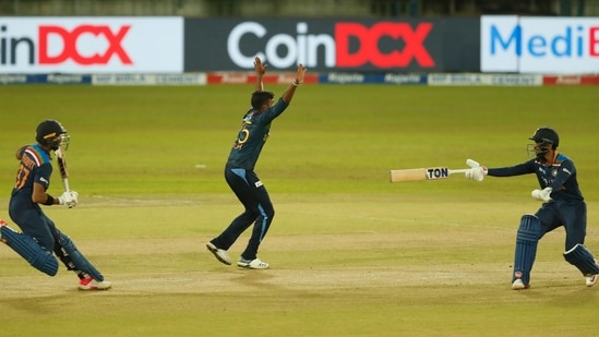 Ruturaj Gaikwad gestures to turn back Devdutt Padikkal as they run between wickets during India vs Sri Lanka 3rd T20I in Colombo.(AP)