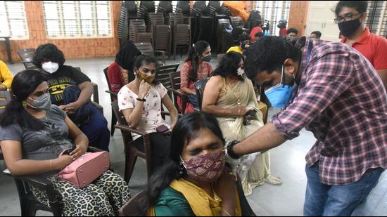 A beneficiary receives a dose of the Covid-19 vaccine in Kochi. (ANI)