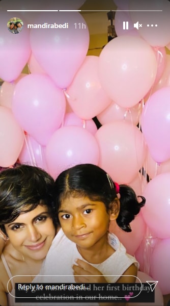 Mandira and Tara smiled for the camera as she held her in her arms.
