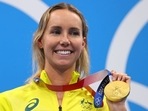 Tokyo 2020: Dazed Australian Emma McKeon wins women's Olympic 100m freestyle.