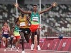 Selemon Barega of Ethiopia celebrates after winning the final