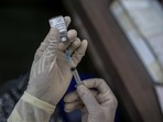 A nurse prepares a dose of Bharat Biotech Ltd. Covaxin vaccine at a Covid-19 vaccination center.(Bloomberg) A nurse prepares a dose of Bharat Biotech Ltd. Covaxin vaccine at a Covid-19 vaccination center.(Bloomberg)