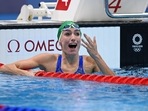 South Africa's Tatjana Schoenmaker celcbrates after she set a new World Record to take gold in the final of the women's 200m breaststroke swimming event during the Tokyo 2020 Olympic Games at the Tokyo Aquatics Centre in Tokyo on July 30, 2021.