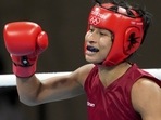 India's Lovlina Borgohain clenches her fist after winning her bout against Chen Nien-Chin of Chinese Taipei during women's welterweight (64-69kg) category boxing match, at the Summer Olympics 2020 in Tokyo. (PTI) India's Lovlina Borgohain clenches her fist after winning her bout against Chen Nien-Chin of Chinese Taipei during women's welterweight (64-69kg) category boxing match, at the Summer Olympics 2020 in Tokyo. (PTI)