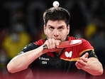 Germany's Dimitrij Ovtcharov serves. 