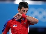 Novak Djokovic reacts during the men's singles semifinal match against Alexander Zverev. 