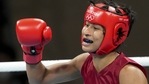 India's Lovlina Borgohain clenches her fist after winning her bout against Chen Nien-Chin of Chinese Taipei during women's welterweight (64-69kg) category boxing match, at the Summer Olympics 2020 in Tokyo. (PTI) India's Lovlina Borgohain clenches her fist after winning her bout against Chen Nien-Chin of Chinese Taipei during women's welterweight (64-69kg) category boxing match, at the Summer Olympics 2020 in Tokyo. (PTI)