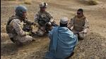 In this December 11, 2009 photo, United States Marine Sgt Isaac Tate (left) and Cpl Aleksander Aleksandrov (centre), interview a local Afghan man with the help of a translator from the 2nd MEB, 4th Light Armoured Reconnaissance Battalion on a patrol in the Helmand province of southern Afghanistan. (AP) In this December 11, 2009 photo, United States Marine Sgt Isaac Tate (left) and Cpl Aleksander Aleksandrov (centre), interview a local Afghan man with the help of a translator from the 2nd MEB, 4th Light Armoured Reconnaissance Battalion on a patrol in the Helmand province of southern Afghanistan. (AP)