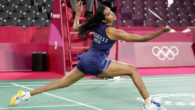 Pusarla V. Sindhu from India plays against Denmark's Mia Blichfeldt during their women's singles round of 16 badminton match at the 2020 Summer Olympics on July 29 in Tokyo. Sindhu will later be in action in the women's singles semifinals today. (Markus Schreiber / AP) Pusarla V. Sindhu from India plays against Denmark's Mia Blichfeldt during their women's singles round of 16 badminton match at the 2020 Summer Olympics on July 29 in Tokyo. Sindhu will later be in action in the women's singles semifinals today. (Markus Schreiber / AP)