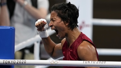 India's Lovlina Borgohain reacts after defeating Nien-Chin Chen of Chinese Taipei, in their women's welter weight 69kg quarterfinal boxing match at the 2020 Summer Olympics on July 30 in Tokyo. (Themba Hadebe / AP) India's Lovlina Borgohain reacts after defeating Nien-Chin Chen of Chinese Taipei, in their women's welter weight 69kg quarterfinal boxing match at the 2020 Summer Olympics on July 30 in Tokyo. (Themba Hadebe / AP)