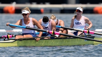 Madeleine Wanamaker, Claire Collins, Kendall Chase, and Grace Luczak, of United States, react after competing in the women's four repechage at the 2020 Summer Olympics, Sunday, July 25 in Tokyo. Luczak had left competitive rowing and taken a job when a move toward gender equity at the Tokyo Games lured her back into taking part at the Games. (Darron Cummings / AP) Madeleine Wanamaker, Claire Collins, Kendall Chase, and Grace Luczak, of United States, react after competing in the women's four repechage at the 2020 Summer Olympics, Sunday, July 25 in Tokyo. Luczak had left competitive rowing and taken a job when a move toward gender equity at the Tokyo Games lured her back into taking part at the Games. (Darron Cummings / AP)