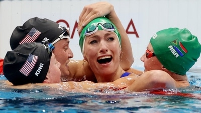 Tatjana Schoenmaker of South Africa celebrates with Lilly King of the United States, Annie Lazor of the United States and Kaylene Corbett of South Africa after setting a new World record in the Women's 200m Breaststroke Final event at Tokyo Aquatics Centre on July 30. (Carl Recine / REUTERS) Tatjana Schoenmaker of South Africa celebrates with Lilly King of the United States, Annie Lazor of the United States and Kaylene Corbett of South Africa after setting a new World record in the Women's 200m Breaststroke Final event at Tokyo Aquatics Centre on July 30. (Carl Recine / REUTERS)