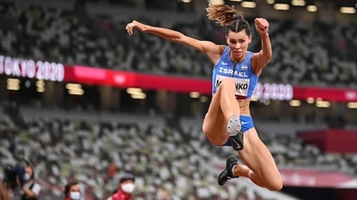 Hanna Knyazyeva-Minenko of Israel in action during the Women's Triple Jump qualification at the Olympic Stadium in Tokyo on July 30. (Dylan Martinez / REUTERS) Hanna Knyazyeva-Minenko of Israel in action during the Women's Triple Jump qualification at the Olympic Stadium in Tokyo on July 30. (Dylan Martinez / REUTERS)