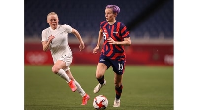 Megan Rapinoe of the United States in action against Betsy Hassett of New Zealand during a Women’s Group G football match, in Tokyo on July 24. Rapinoe is an openly queer sportsperson and advocate for LGBTQ rights and racism. (Molly Darlington / REUTERS) Megan Rapinoe of the United States in action against Betsy Hassett of New Zealand during a Women’s Group G football match, in Tokyo on July 24. Rapinoe is an openly queer sportsperson and advocate for LGBTQ rights and racism. (Molly Darlington / REUTERS)