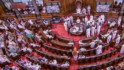 Opposition MPs shout slogans demanding a discussion on Pegasus in Rajya Sabha during the Monsoon Session of Parliament, in New Delhi. (PTI File)