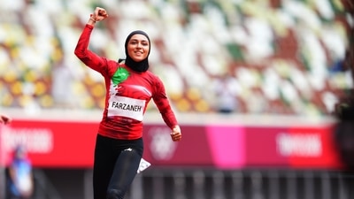 Farzaneh Fasihi of Iran reacts after the preliminary round of the Women's 100m race at the Olympic Stadium, Tokyo on July 30. (Aleksandra Szmigiel / REUTERS) Farzaneh Fasihi of Iran reacts after the preliminary round of the Women's 100m race at the Olympic Stadium, Tokyo on July 30. (Aleksandra Szmigiel / REUTERS)