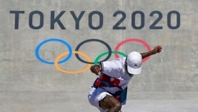 Nyjah Huston, of the United States, competes in men's street skateboarding during the Tokyo Olympics. (AP) Nyjah Huston, of the United States, competes in men's street skateboarding during the Tokyo Olympics. (AP)