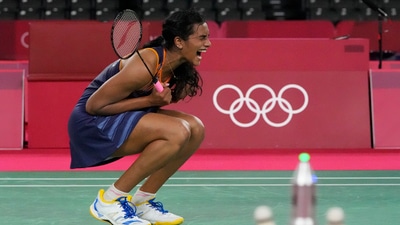 Pusarla V. Sindhu celebrates after winning against Japan's Akane Yamaguchi during their women's singles badminton quarterfinal match at the 2020 Summer Olympics,. (AP) Pusarla V. Sindhu celebrates after winning against Japan's Akane Yamaguchi during their women's singles badminton quarterfinal match at the 2020 Summer Olympics,. (AP)