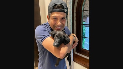 The image shows Sachin Tendulkar with his pet dog named Spike. (Twitter/@sachin_rt)