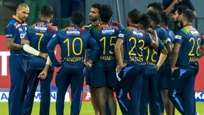 Shikhar Dhawan interacts with Sri Lankan players after the completion of 3rd T20I. (Getty)