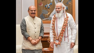 Prime Minister Narendra Modi with new Karnataka chief minister Basavaraj Bommai in New Delhi on Friday. (PTI)